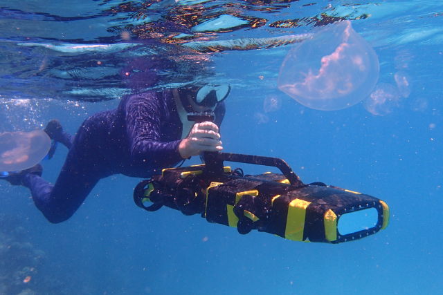 QUT's Dr Matt Dunbabin puts a RangerBot to the test on the Great Barrier Reef